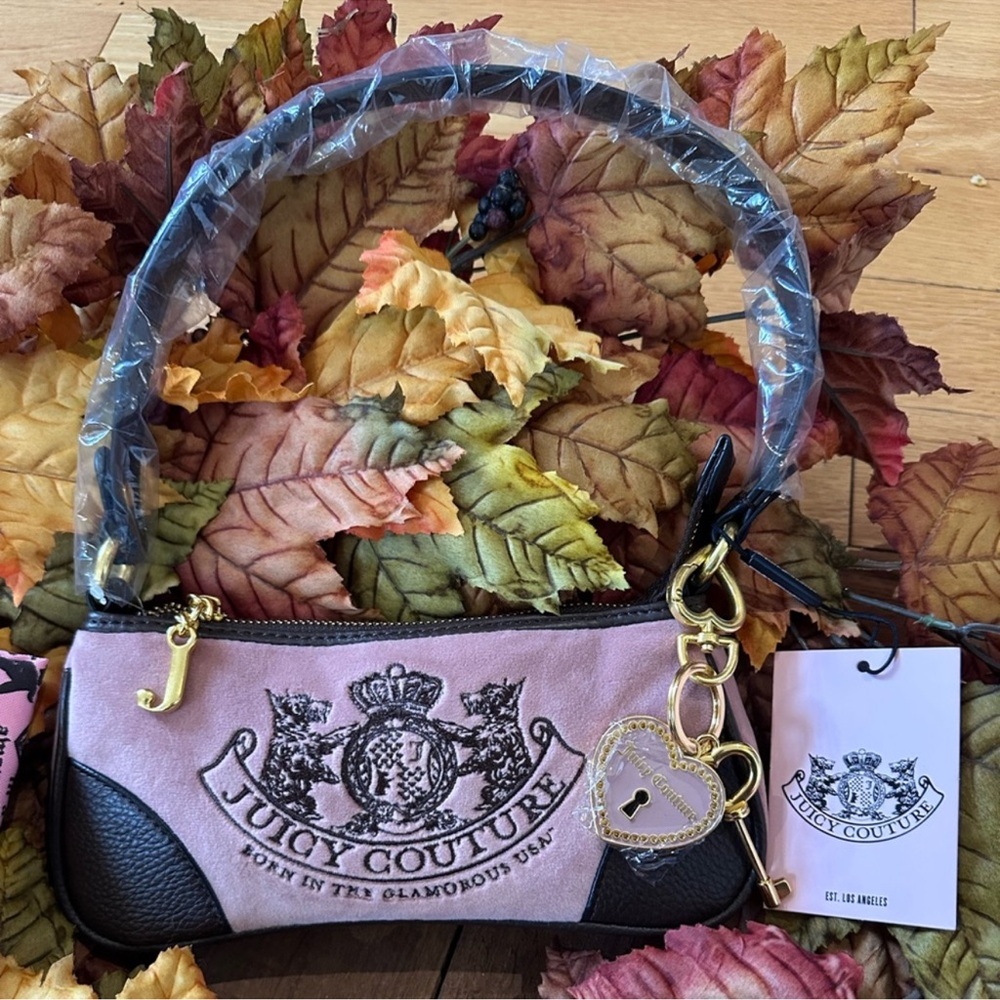 Juicy Couture UK exclusive new with tags small pink bag with pink dust bag